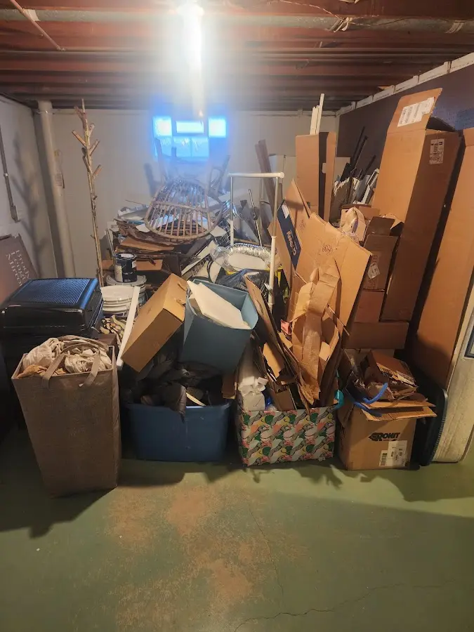 Roll-off dumpster container at job site for 2 Yard Dumpster Rental in Green